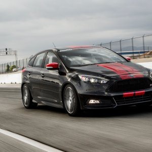 2015-Ford-Focus-ST-with-Mountune-Modifications-front-three-quarter-in-motion.jpg